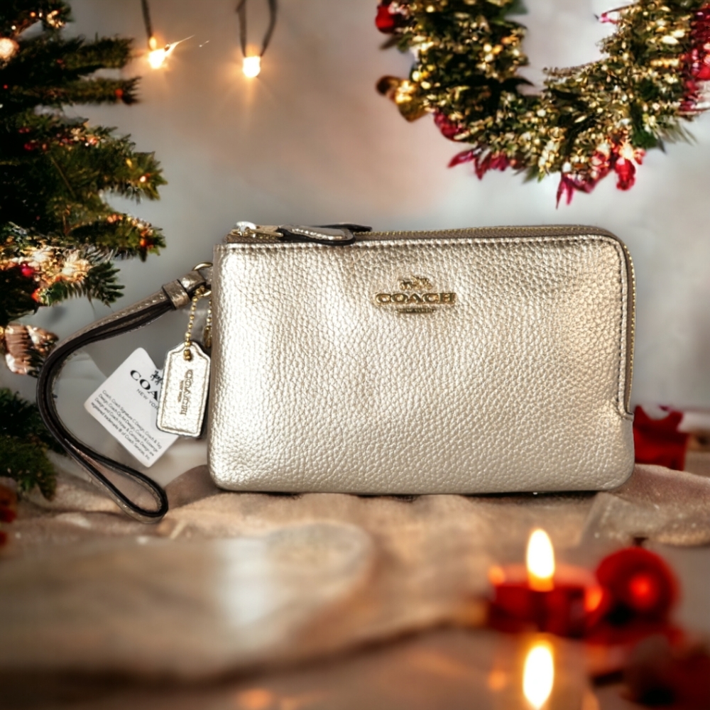 Coach: Beautiful platinum gold double corner zip wristlet in pebbled leather